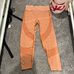 Orange High-Waisted Athletic Leggings with Color-Block Design